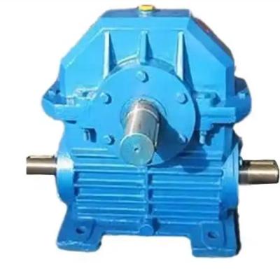 What are the specific effects of different materials on the performance of WXJ120-31-3 worm gear reducer?